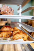 Sweet pastries on a shelf in a bakery