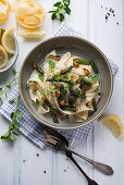 Tagliatelle in a cashew nut cream with grilled green asparagus and smoked tofu