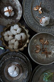 Arrangement of cotton bolls in Oriental silver bowls