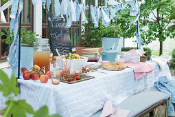 Table setting for a garden party in summer