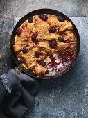 Blackberry and croissant bread and butter pudding