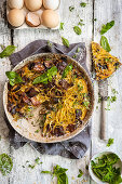 Spaghetti frittata with mushrooms