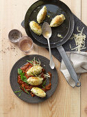 Courgette and cheese dumplings with minced meat sauce