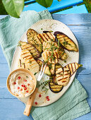 Grilled aubergines and cheese with an oriental pomegranate and quark