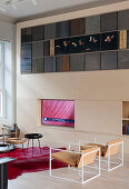 Living room wall with integrated artwork in loft apartment