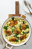 Roasted chicken thighs with gnocci and spinach