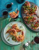 Prawns wrapped in bacon with bruscetta