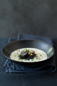 Celery and chestnut soup with blood sausage