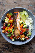 Fried salmon with avocado salsa and rice