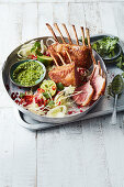 Roasted lamb rack with herb and almond pesto