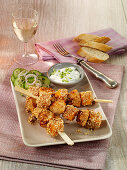 Pumpkin skewers with chicken and sesame seeds