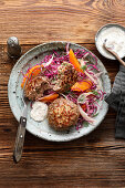 Game meatballs with red cabbage salad