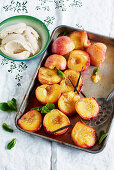 Maple syrup and vanilla baked peaches with ice cream