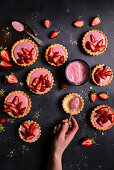 Shortbread tartlets with yoghurt, strawberry jelly and fresh strawberries