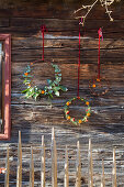 Scented wreaths decorated with shapes cut out of orange peel