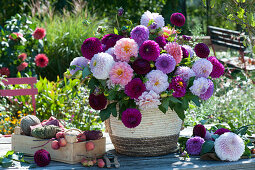 Dahlia bouquet from ball dahlias and decorative dahlias in a basket, box with string