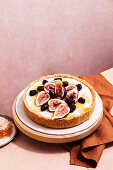 Honey and macadamia tart with figs and blackberries