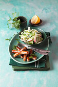 Savoy cabbage salad with sausages