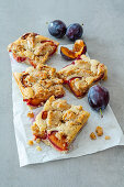 Autumn brookie (brownie with a cookie crust) with plums and walnuts