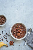 Brown chia pudding bowl with cocoa and walnut crumble