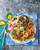 Mixed grill seafood platter - Smokey prawns, Beer steamed mussels, Zesty yellowtail