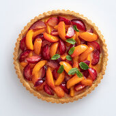 Apricot and plum crostata with ginger cream