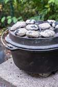 Dutch oven with charcoal