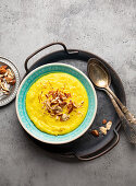 Traditional Indian kheer (Sweet rice milk pudding with almonds and saffron)