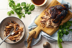 Slow roasted pulled pork with barbecue sauce