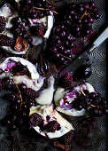 Brie with roasted concord grapes, figs, blackberries and thyme with balsamic vinegar and honey