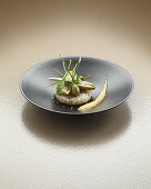 Bream tartare with artichokes and caperfruit