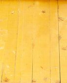 Yellow glazed wood background