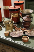 Herbs and spices with antique apothecary utensils