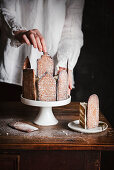 Christmas cake decorated with gingerbread houses