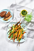 Carrot salad with colourful roasted carrots with carrot leaf pesto and pumpernickel crumbs