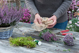 Tying a heather ball from budding heather and moss