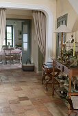 Open country style living room with terracotta tiled floor