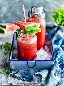 Watermelon juice in glass jars