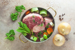 Ingredients for beef broth in a pot