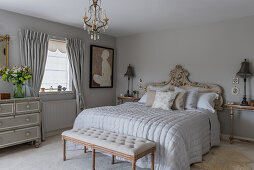 Master bedroom, bed with decorative bedhead