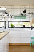 Ribbon windows in white, modern kitchen