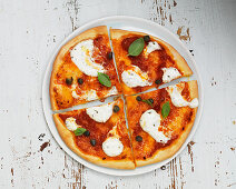 Pizza with cream cheese and capers