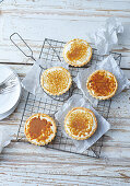 Passion fruit tarts with almond shortcrust pastry