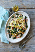 Maple roasted marrow on cavolo nero salad with hazelnut sherry dressing