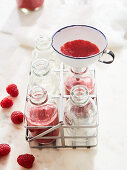Bottling raspberry smoothies
