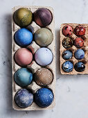 Tray of eggs dyed in different colors for Easter