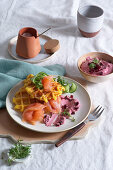 Sweet potato waffle with salmon and beetroot cream