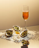 Oysters au gratin with a tea and champagne cocktail
