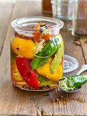 Pickled red and yellow pepper with white cabbage