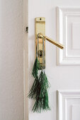 DIY pine-needel tassels on door handle